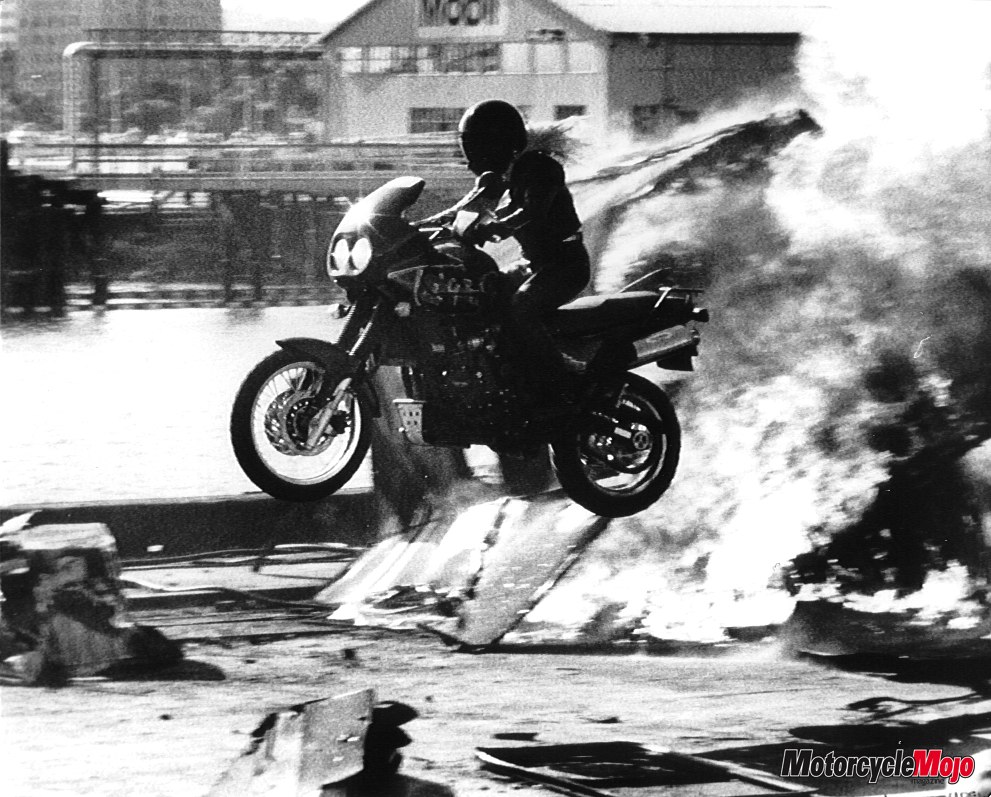 Motorcycle jump through wire and fire