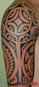 arm and shoulder tribal tattoo